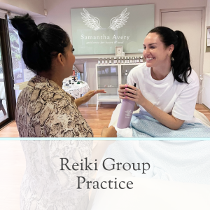 two female reiki healers laughing
