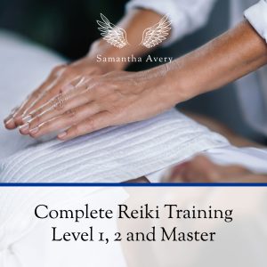 Reiki Practitioner giving healing by placing hands on the chest of a client.